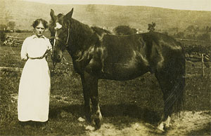 photograph of Lucy Seger with a horse